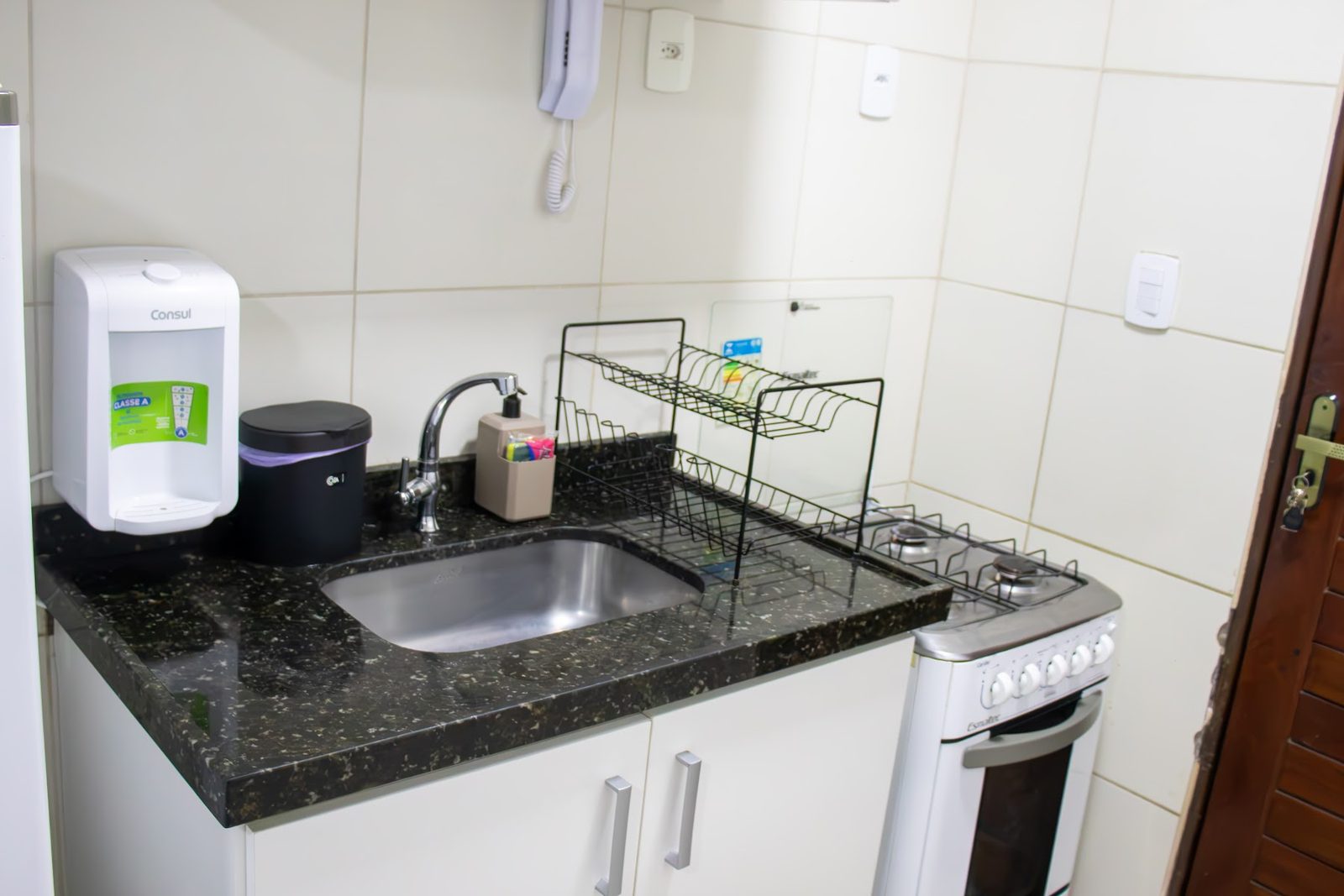 Apartamento 104 · Pia e fogão — Aruanda