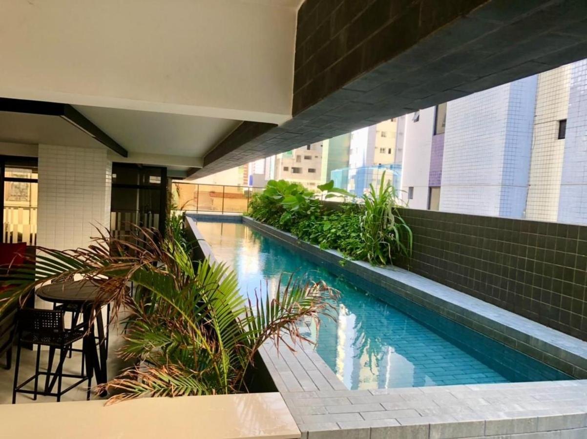 Pool and garden — Co-House Tambaú